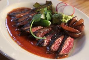 Split La Luna's delicious carne asada with chile de arbol sauce, sauteed veggies, and a gordita de pastor and...